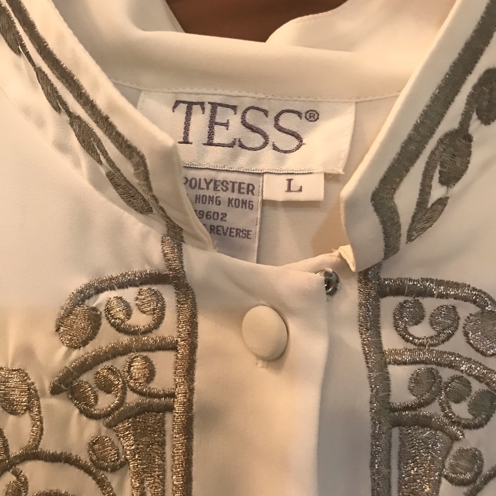Size large blouse with a silky feeling you’ll love this one make me an offer